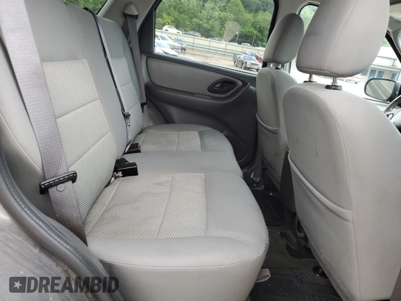 2006 Ford Escape XLT with VIN 1FMYU03136KD47701, listed as a Copart auction lot 58008695 with 176,341 mi miles and Salvage title. Bid and sale history available at DreamBid. Image 11.
