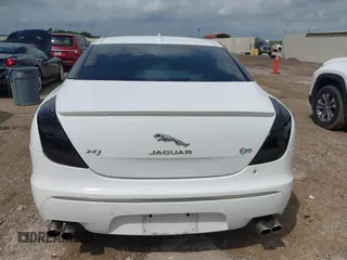 2014 Jaguar XJ R with VIN SAJWA1EK3EMV58692, listed as a IAAI auction lot 42663979 with 111,386 mi miles and . Bid and sale history available at DreamBid. Image 16.