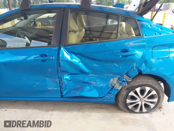 2020 Toyota Prius LE with VIN JTDL9RFU5L3018787, listed as a IAAI auction lot 42723431 with 30,793 mi miles and . Bid and sale history available at DreamBid. Image 6.