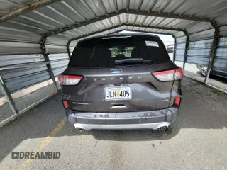 2020 Ford Escape Titanium Hybrid with VIN 1FMCU0DZ2LUB82013, listed as a IAAI auction lot 42727391 with 92,623 mi miles and . Bid and sale history available at DreamBid. Image 4.