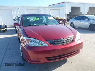 2004 Toyota Camry LE with VIN 4T1BE32KX4U272768, listed as a IAAI auction lot 42006421 with 204,386 mi miles. Bid and sale history available at carsss.com. Image 12.