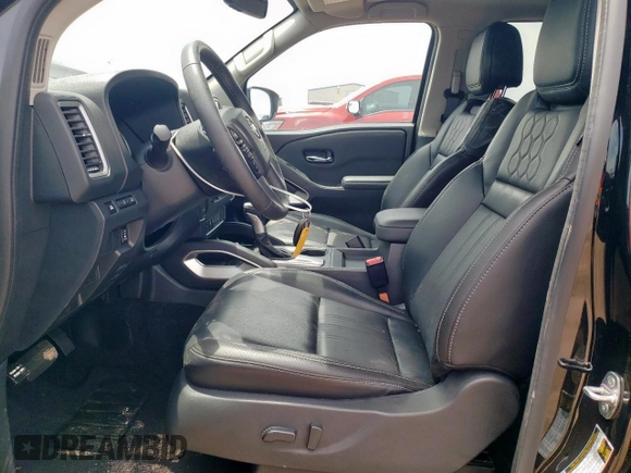 2024 Nissan Frontier Pro-X z VIN 1N6ED1EJ5RN669959, wystawiony jako Copart lot #58217315 z przebiegiem 3 828 mil mil oraz Szkoda całkowita • Salvage title. Historia ofert i sprzedaży dostępna na DreamBid. Obrazek 7.