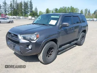 2015 Toyota 4Runner Limited with VIN JTEBU5JR9F5270455, listed as a IAAI auction lot 42157052 with 141,866 mi miles and . Bid and sale history available at carsss.com. Image 2.
