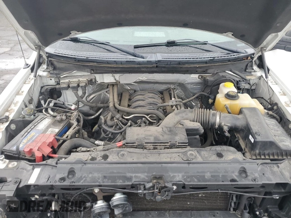 2014 Ford F-150 XL with VIN 1FTNF1EFXEKD42719, listed as a Copart auction lot 57966955 with 136,751 mi miles and Salvage title. Bid and sale history available at DreamBid. Image 11.
