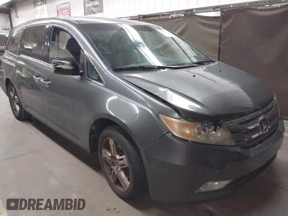 2012 Honda Odyssey Touring с VIN 5FNRL5H99CB047340, выставлен на аукционе IAAI как лот 41965189 с пробегом Не указан миль и . История ставок и продаж доступна на DreamBid. Изображение 1.