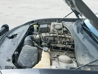 2020 Dodge Charger Police z VIN 2C3CDXKT4LH120180, wystawiony jako IAAI lot #42834441 z przebiegiem 128 459 mil mil oraz . Historia ofert i sprzedaży dostępna na DreamBid. Obrazek 20.