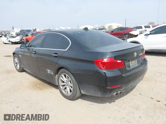 2015 BMW 5 Series 528i with VIN WBA5A5C58FD520694, listed as a IAAI auction lot 41804906 with 121,636 mi miles. Bid and sale history available at carsss.com. Image 3.