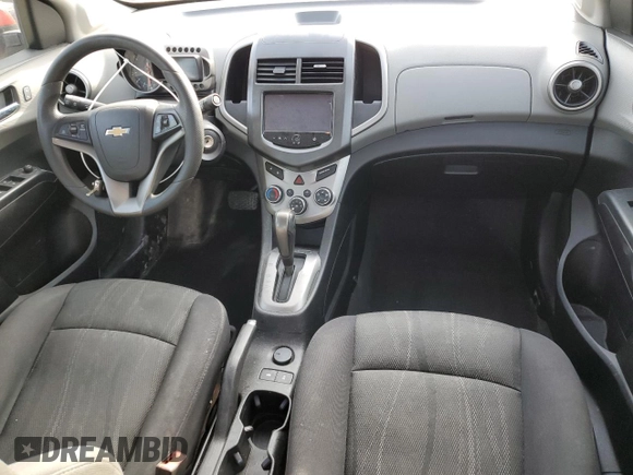 2015 Chevrolet Sonic LT with VIN 1G1JC5SH8F4162447, listed as a Copart auction lot 82182954 with 114,956 mi miles and Salvage Title. Bid and sale history available at DreamBid. Image 8.