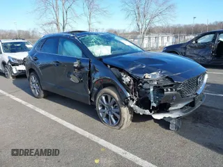 2022 Mazda CX-30 S Premium with VIN 3MVDMBDL9NM403273, listed as a IAAI auction lot 41607227 with Not Provided miles and . Bid and sale history available at carsss.com. Image 1.