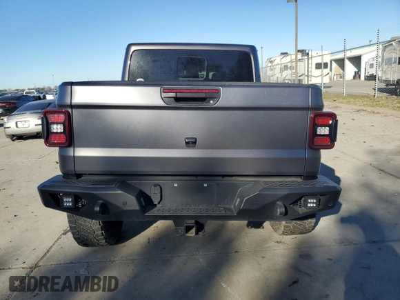 2021 Jeep Gladiator Rubicon с VIN 1C6JJTBM4ML594204, выставлен на аукционе Copart как лот 83998224 с пробегом 25 852 миль миль и Списание • Salvage title. История ставок и продаж доступна на DreamBid. Изображение 6.