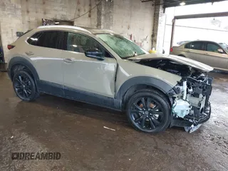 2024 Mazda CX-30 2.5 Carbon Turbo with VIN 3MVDMBXY5RM600986, listed as a IAAI auction lot 41179336 with 20,890 mi miles. Bid and sale history available at carsss.com. Image 1.