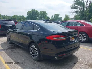 2017 Ford Fusion Titanium with VIN 3FA6P0D92HR252476, listed as a IAAI auction lot 40176942 with 88,818 mi miles and . Bid and sale history available at DreamBid. Image 3.