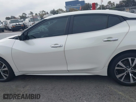 2016 Nissan Maxima SL with VIN 1N4AA6AP3GC448957, listed as a IAAI auction lot 41734717 with 128,687 mi miles and . Bid and sale history available at DreamBid. Image 14.