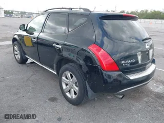2006 Nissan Murano SL with VIN JN8AZ08T06W411157, listed as a IAAI auction lot 41957424 with 121,902 mi miles. Bid and sale history available at carsss.com. Image 3.