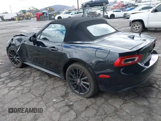 2018 FIAT 124 Spider Classica z VIN JC1NFAEK7J0138993, wystawiony jako IAAI lot #41726083 z przebiegiem 16 974 mil mil oraz . Historia ofert i sprzedaży dostępna na DreamBid. Obrazek 3.