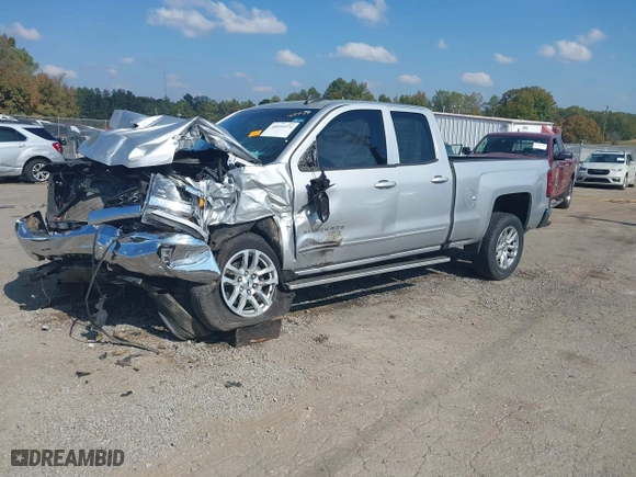 2016 Chevrolet Silverado 1500 LT with VIN 1GCRCREC3GZ119267, listed as a IAAI auction lot 40692574 with 136,704 mi miles. Bid and sale history available at carsss.com. Image 2.