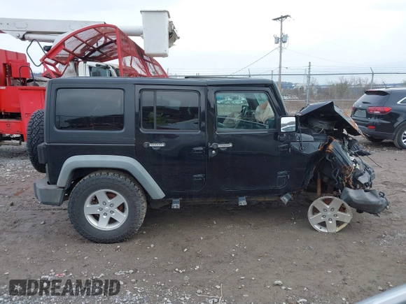 2011 Jeep Wrangler Unlimited Sport with VIN 1J4BA3H17BL552319, listed as a IAAI auction lot 41747031 with 120,751 mi miles. Bid and sale history available at carsss.com. Image 14.