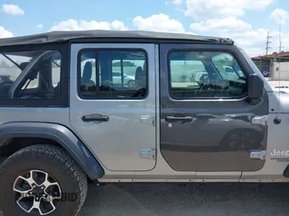 2020 Jeep Wrangler Unlimited Sport with VIN 1C4HJXDN6LW181802, listed as a IAAI auction lot 42402956 with 65,053 mi miles and . Bid and sale history available at DreamBid. Image 13.
