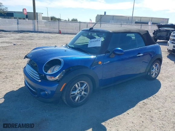 2013 MINI Cooper Convertible with VIN WMWZN3C56DT135566, listed as a IAAI auction lot 41414064 with 58,593 mi miles. Bid and sale history available at carsss.com. Image 2.