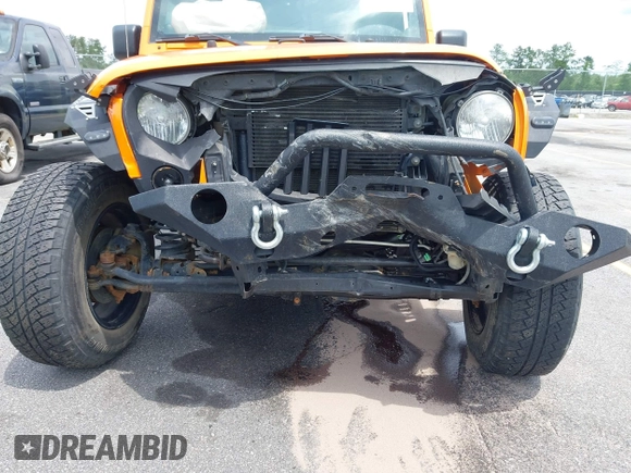 2013 Jeep Wrangler Sport z VIN 1C4AJWAG2DL538526, wystawiony jako IAAI lot #42378501 z przebiegiem 81 709 mil mil oraz . Historia ofert i sprzedaży dostępna na DreamBid. Obrazek 6.