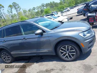 2021 Volkswagen Tiguan SE z VIN 3VV3B7AX7MM113248, wystawiony jako IAAI lot #42025906 z przebiegiem 92 442 mil mil oraz . Historia ofert i sprzedaży dostępna na DreamBid. Obrazek 13.