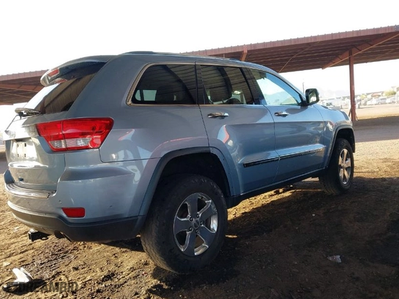 2012 Jeep Grand Cherokee Limited with VIN 1C4RJFBG2CC317363, listed as a IAAI auction lot 41689903 with 158,020 mi miles. Bid and sale history available at carsss.com. Image 4.