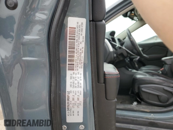 2015 Jeep Cherokee Trailhawk with VIN 1C4PJMBS0FW578199, listed as a Copart auction lot 77538544 with 122,444 mi miles and Salvage Title. Bid and sale history available at carsss.com. Image 12.