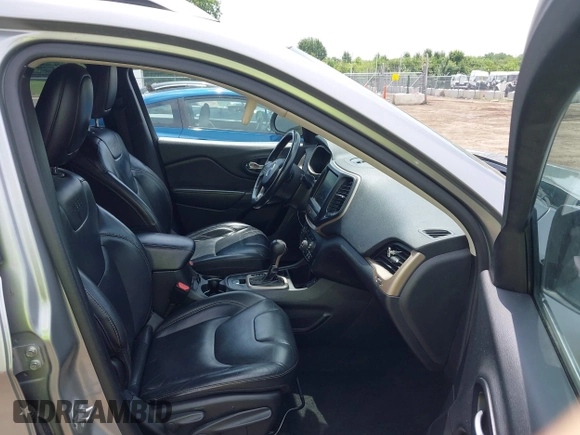 2016 Jeep Cherokee Limited with VIN 1C4PJLDB7GW164619, listed as a IAAI auction lot 42534654 with 252,788 mi miles and . Bid and sale history available at DreamBid. Image 5.