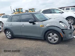 2015 MINI Hardtop 4 Door with VIN WMWXS5C56FT830418, listed as a IAAI auction lot 42132285 with 111,428 mi miles and . Bid and sale history available at DreamBid. Image 13.
