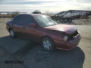 2001 Kia Sephia z VIN KNAFB121015028494, wystawiony jako Copart lot #81581404 z przebiegiem 86 655 mil mil oraz Szkody całkowita. Historia ofert i sprzedaży dostępna na DreamBid. Obrazek 4.