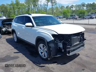 2021 Volkswagen Atlas SE z VIN 1V2WR2CA2MC529355, wystawiony jako IAAI lot #41972048 z przebiegiem 63 970 mil mil oraz . Historia ofert i sprzedaży dostępna na DreamBid. Obrazek 1.