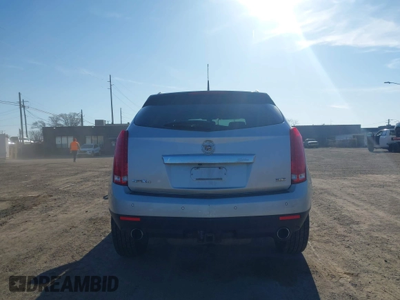 2013 Cadillac SRX Performance Collection z VIN 3GYFNHE33DS540108, wystawiony jako IAAI lot #42061957 z przebiegiem 182 797 mil mil oraz . Historia ofert i sprzedaży dostępna na DreamBid. Obrazek 16.