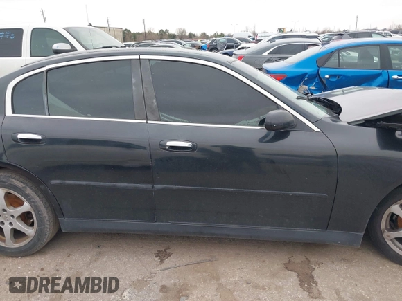 2003 Infiniti G35 w/Leather with VIN JNKCV51E53M316091, listed as a IAAI auction lot 41650677 with Not Provided miles and . Bid and sale history available at carsss.com. Image 12.