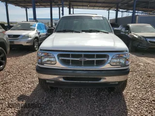 1999 Ford Explorer XLT with VIN 1FMZU34E2XZA06337, listed as a Copart auction lot 45536845 with 170,605 mi miles and Salvage title. Bid and sale history available at DreamBid. Image 5.
