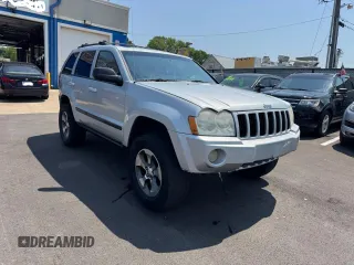 2007 Jeep Grand Cherokee Laredo z VIN 1J8GR48K77C502202, wystawiony jako Copart lot #60689055 z przebiegiem 177 088 mil mil oraz Czysty tytuł • Clean title. Historia ofert i sprzedaży dostępna na DreamBid. Obrazek 1.