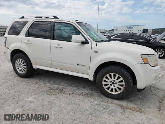 2009 Mercury Mariner Hybrid with VIN 4M2CU29369KJ14719, listed as a Copart auction lot 62511705 with 144,062 mi miles and Salvage title. Bid and sale history available at DreamBid. Image 4.