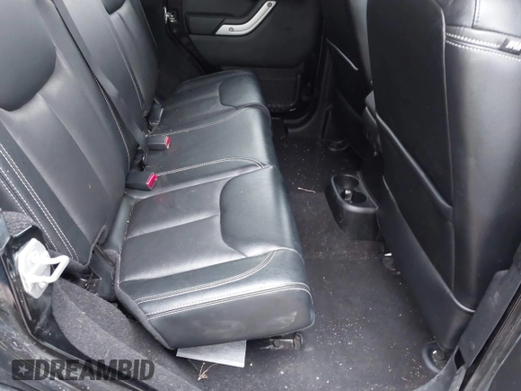 2016 Jeep Wrangler Unlimited 75th Anniversary with VIN 1C4HJWEG3GL181371, listed as a IAAI auction lot 41864965 with 64,259 mi miles and . Bid and sale history available at DreamBid. Image 8.