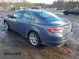 2009 Mazda 6 S Grand Touring with VIN 1YVHP82B995M06204, listed as a IAAI auction lot 41578992 with 140,255 mi miles and . Bid and sale history available at DreamBid. Image 3.