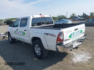 2014 Toyota Tacoma PreRunner with VIN 3TMJU4GN7EM158230, listed as a IAAI auction lot 40010521 with 145,185 mi miles. Bid and sale history available at carsss.com. Image 3.