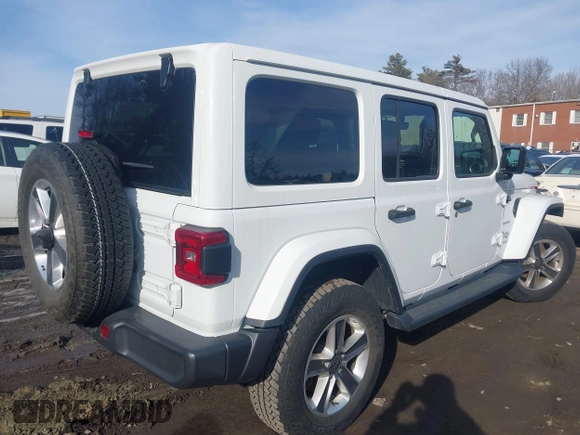 2021 Jeep Wrangler Unlimited Sahara with VIN 1C4HJXEG9MW532302, listed as a IAAI auction lot 41646755 with 32,893 mi miles and . Bid and sale history available at DreamBid. Image 4.