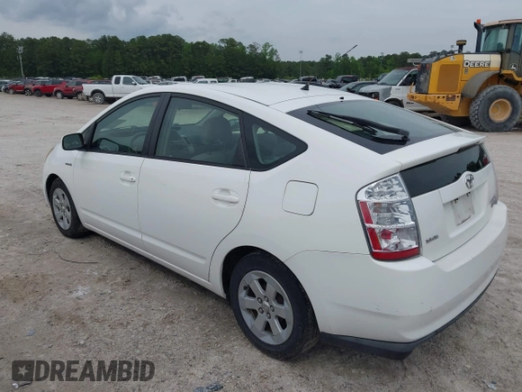 2006 Toyota Prius with VIN JTDKB20U567529834, listed as a IAAI auction lot 42119723 with 209,638 mi miles. Bid and sale history available at carsss.com. Image 3.