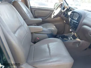2004 Toyota Sequoia SR5 with VIN 5TDZT34A24S229611, listed as a IAAI auction lot 41224321 with 164,483 mi miles. Bid and sale history available at carsss.com. Image 5.