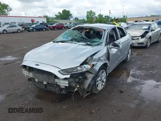 2016 Ford Fusion SE z VIN 1FA6P0HD1G5128697, wystawiony jako IAAI lot #42223379 z przebiegiem Nie podano mil oraz . Historia ofert i sprzedaży dostępna na DreamBid. Obrazek 6.