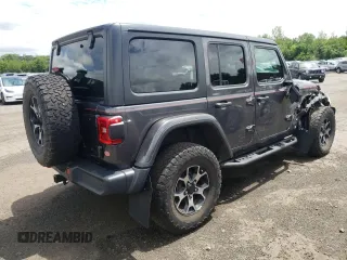 2018 Jeep Wrangler Unlimited Rubicon with VIN 1C4HJXFG1JW261472, listed as a Copart auction lot 63259345 with 60,457 mi miles and Salvage title. Bid and sale history available at DreamBid. Image 3.