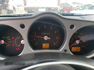 2004 Nissan 350Z Touring with VIN JN1AZ34D24M103656, listed as a Copart auction lot 55100955 with 130,561 mi miles and Salvage title. Bid and sale history available at DreamBid. Image 9.