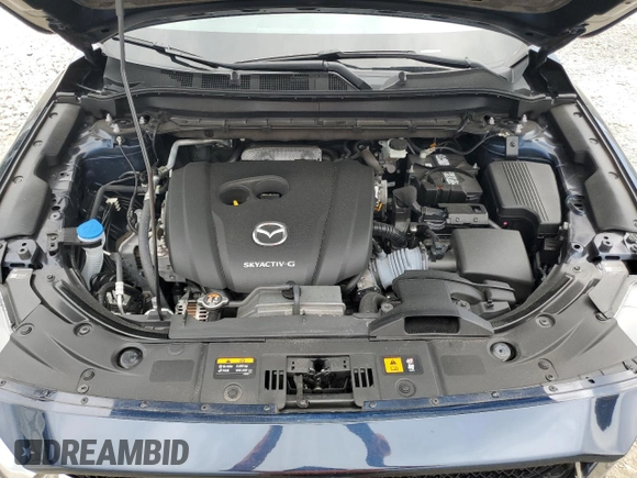 2021 Mazda CX-5 Grand Touring z VIN JM3KFBDM5M0464611, wystawiony jako Copart lot #62829065 z przebiegiem 20 525 mil mil oraz Nie do naprawy • Non repairable. Historia ofert i sprzedaży dostępna na DreamBid. Obrazek 12.