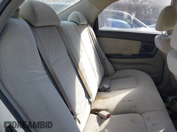 2004 Kia Spectra LX with VIN KNAFE121745036331, listed as a IAAI auction lot 41735613 with 67,634 mi miles. Bid and sale history available at carsss.com. Image 8.