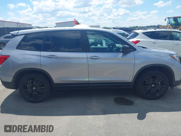 2021 Honda Passport Sport with VIN 5FNYF7H27MB003467, listed as a IAAI auction lot 42183219 with 52,156 mi miles and . Bid and sale history available at DreamBid. Image 13.