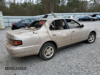 1993 Toyota Camry LE with VIN 4T1SK12E5PU316445, listed as a Copart auction lot 77534394 with 175,506 mi miles and Salvage Title. Bid and sale history available at carsss.com. Image 3.