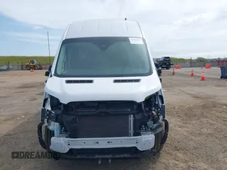 2022 Ford Transit Cargo with VIN 1FTBW3XG9NKA84214, listed as a IAAI auction lot 42033413 with 6,746 mi miles and . Bid and sale history available at DreamBid. Image 6.